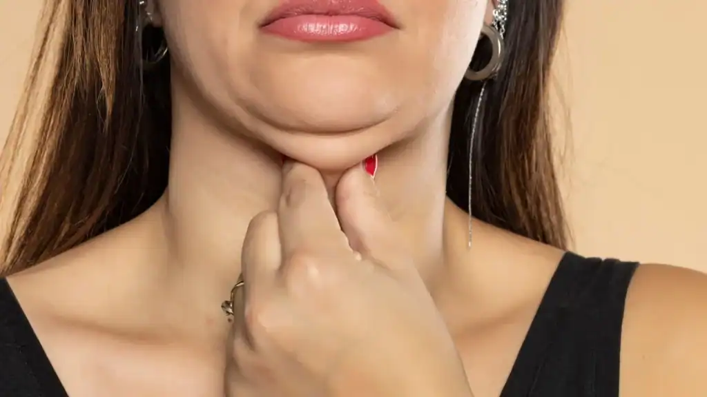 An image of a woman with double chin, sad, worried : Non Surgical Double Chin Removal Treatment in Eton, UK